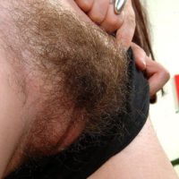 Amateur Euro females unbutton and show off their naturally hairy pussies