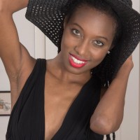 Bony ebony first timer Saf spreads her all-natural twat while wearing a sun hat and high-heels