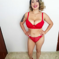 Inked Latina female Sofia Santana looses her large breasts during a POV hand-job