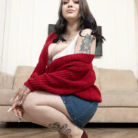Inked girl Kira Clark unveils her big tits in high-heeled shoes