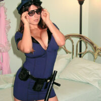 Redheaded policewoman Chloe Vevrier arrest a dude before getting naked in her bedroom
