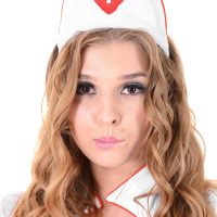 Solo model Alina N works herself loose from her horny nurse unfiorm