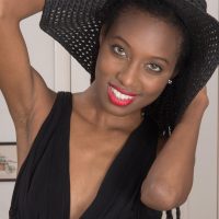 Thin ebony first timer Saf opens up her natural vagina while attired a sun hat and stilettos